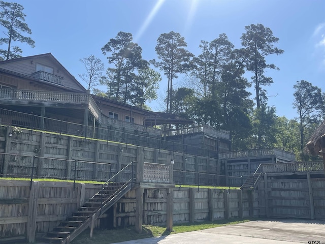 464 Forest Hills Dr, Livingston, TX 77351 - view of building exterior with stairs