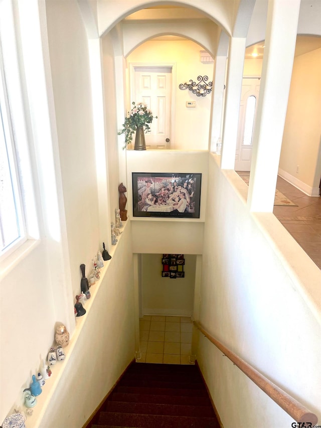 stairway with wood-type flooring