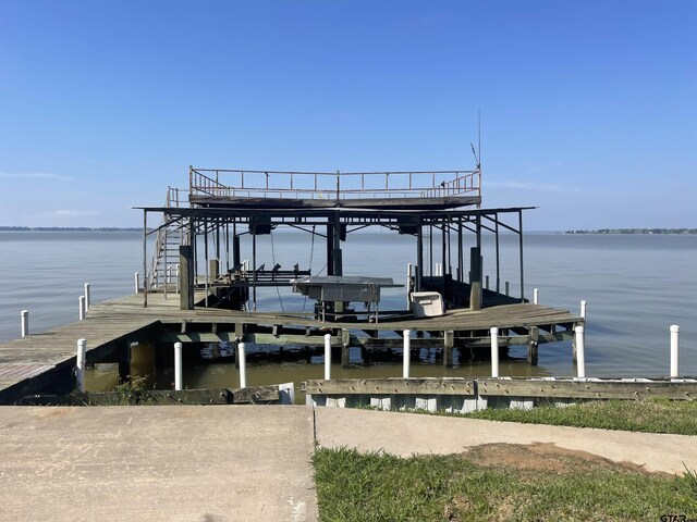 464 Forest Hills Dr, Livingston, TX 77351 - dock area featuring boat lift and a water view