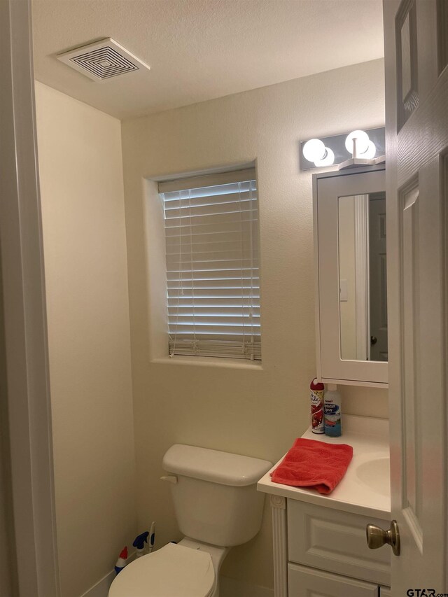 464 Forest Hills Dr, Livingston, TX 77351 - bathroom featuring toilet and vanity