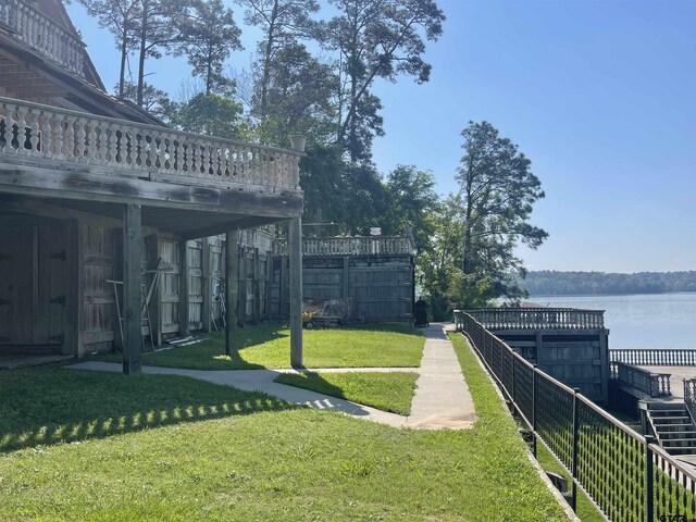 464 Forest Hills Dr, Livingston, TX 77351 - view of yard with a deck with water view