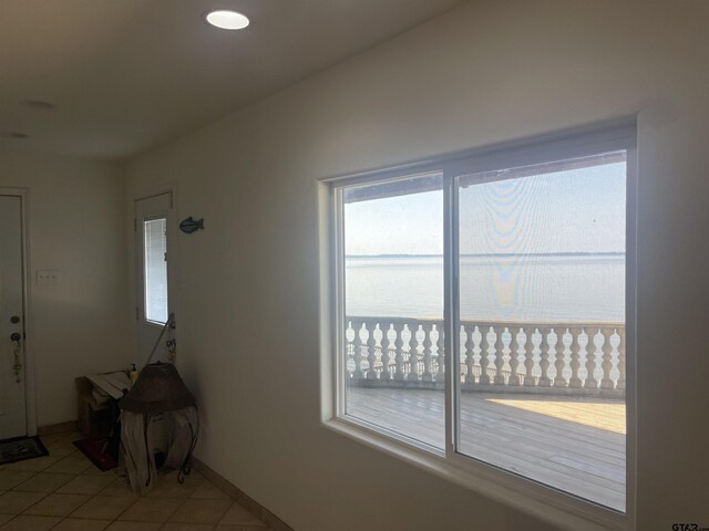 464 Forest Hills Dr, Livingston, TX 77351 - interior space with light tile patterned floors and baseboards