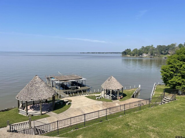 464 Forest Hills Dr, Livingston, TX 77351 - water view featuring a gazebo, a dock, and boat lift