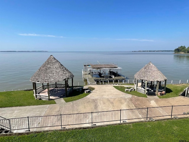 exterior space with a water view and a gazebo