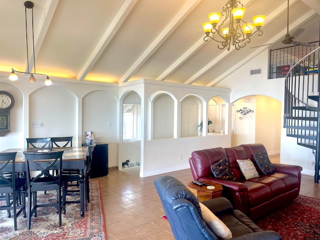 living room with high vaulted ceiling, beamed ceiling, tile patterned floors, and ceiling fan with notable chandelier