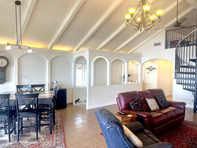 464 Forest Hills Dr, Livingston, TX 77351 - living area featuring arched walkways, tile patterned floors, stairs, beamed ceiling, and high vaulted ceiling