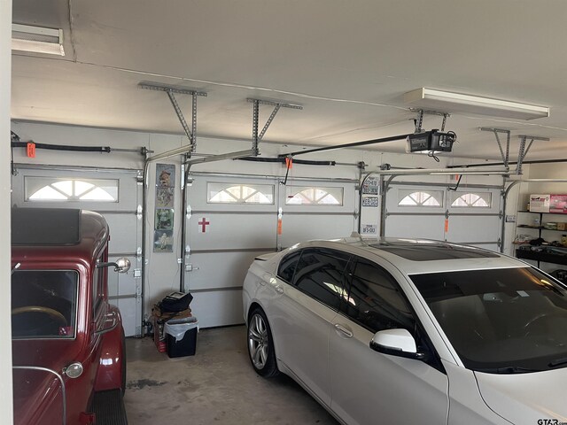 464 Forest Hills Dr, Livingston, TX 77351 - garage with a garage door opener