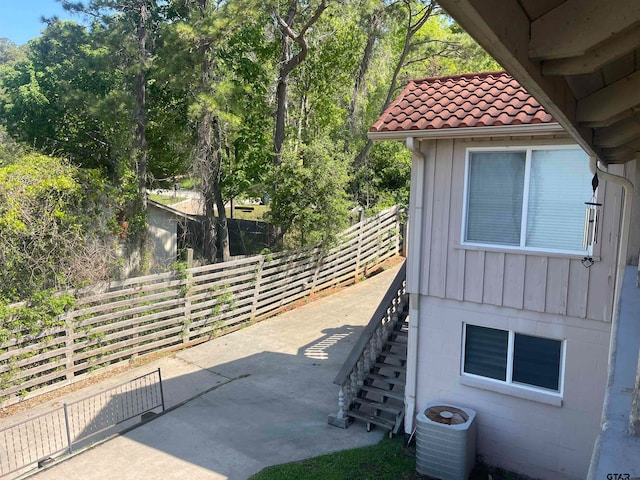 view of home's exterior featuring central AC and a patio area