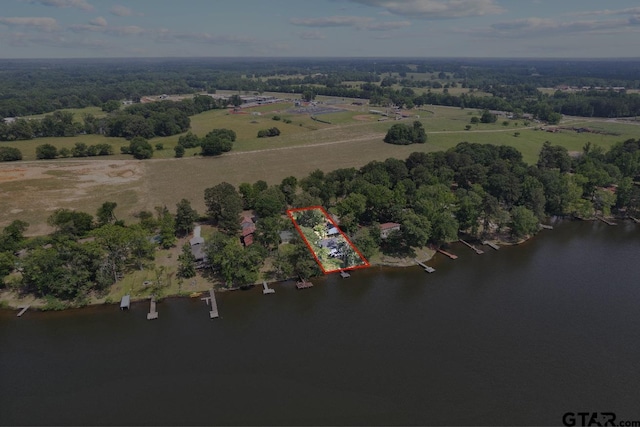 drone / aerial view with a water view and a rural view