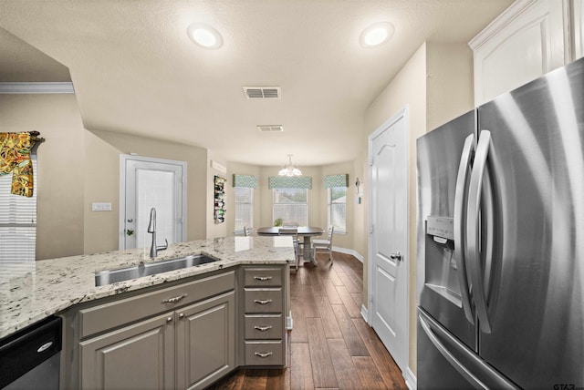 kitchen featuring gray cabinetry, stainless steel appliances, dark hardwood / wood-style floors, sink, and white cabinets