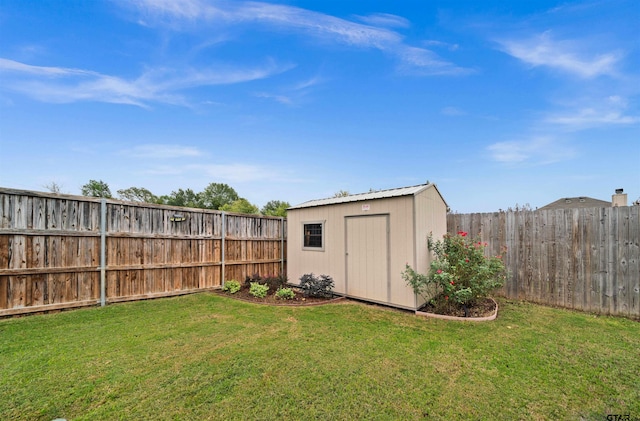 view of outbuilding featuring a yard