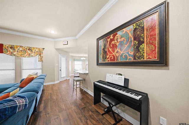 miscellaneous room with heating unit, dark hardwood / wood-style flooring, and ornamental molding