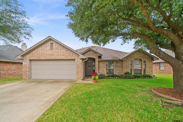 single story home featuring a garage and a front yard