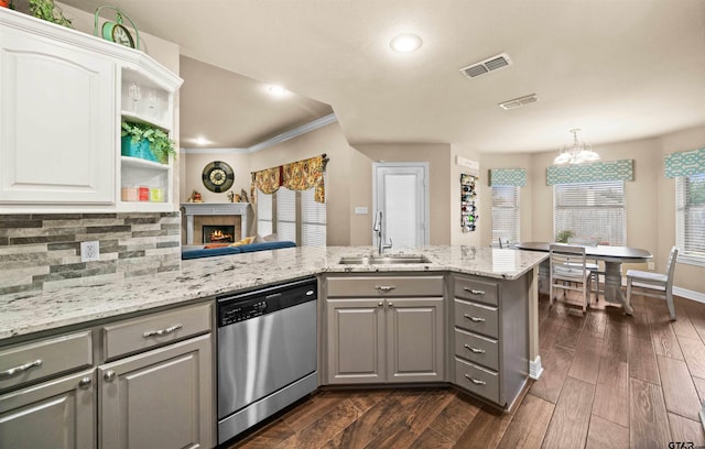 kitchen featuring sink, a healthy amount of sunlight, white cabinets, gray cabinetry, and dishwasher