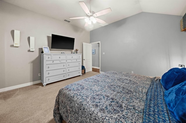 bedroom featuring ceiling fan, carpet flooring, and vaulted ceiling