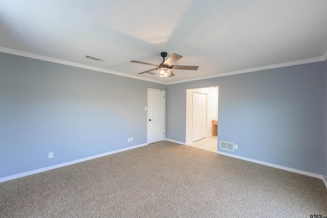 unfurnished bedroom with ceiling fan, light colored carpet, ornamental molding, and a closet