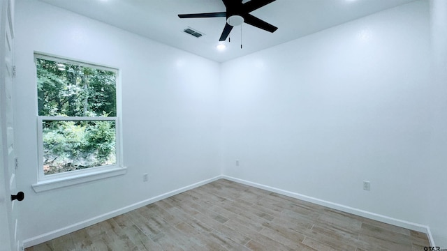 20428 High Point Dr, Flint, TX 75762 - empty room featuring ceiling fan, light wood-type flooring, plenty of natural light, and recessed lighting