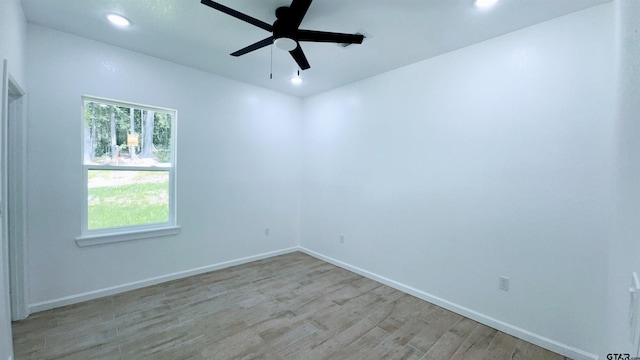 20428 High Point Dr, Flint, TX 75762 - empty room with a ceiling fan, light wood-type flooring, and recessed lighting