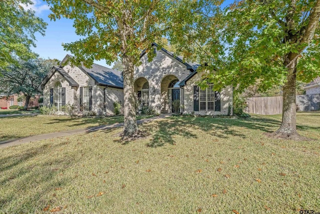 view of front facade with a front lawn