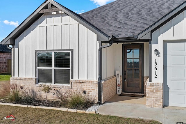 entrance to property featuring a garage