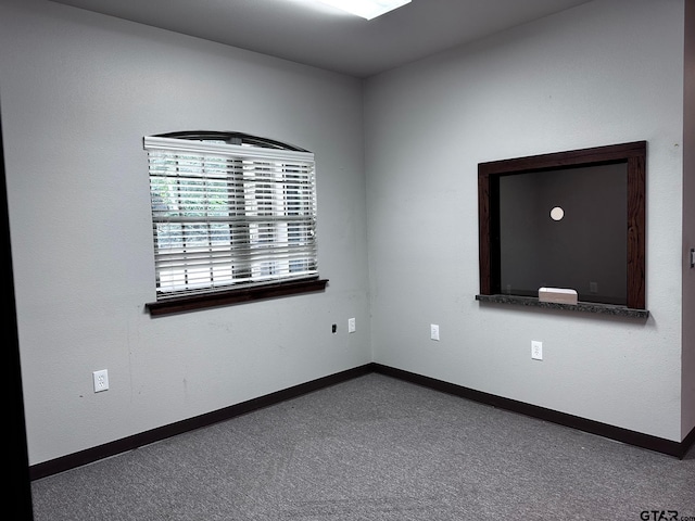 133 E Reagan St, Palestine, TX 75801 - empty room with baseboards