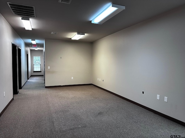 133 E Reagan St, Palestine, TX 75801 - spare room featuring carpet floors and baseboards