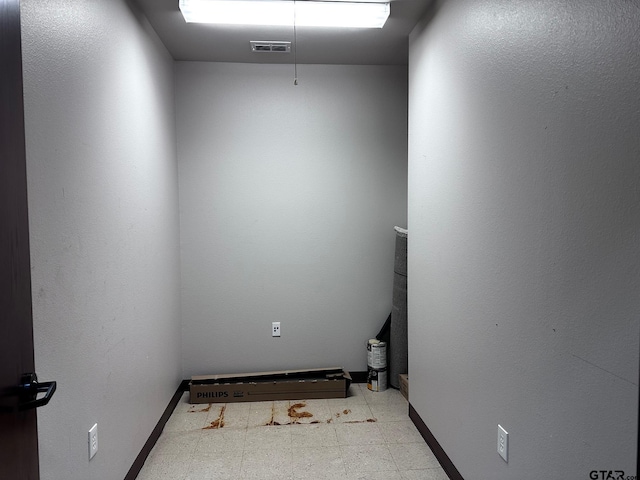 133 E Reagan St, Palestine, TX 75801 - washroom featuring tile patterned floors and baseboards