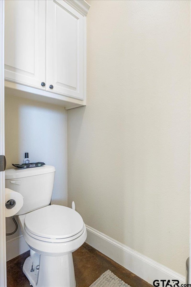 1009 Stagecoach Bnd, Bullard, TX 75757 - bathroom with baseboards and toilet