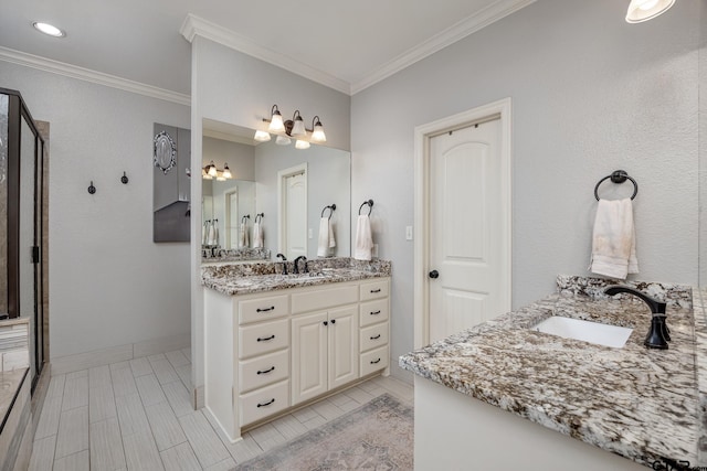 bathroom featuring vanity and ornamental molding