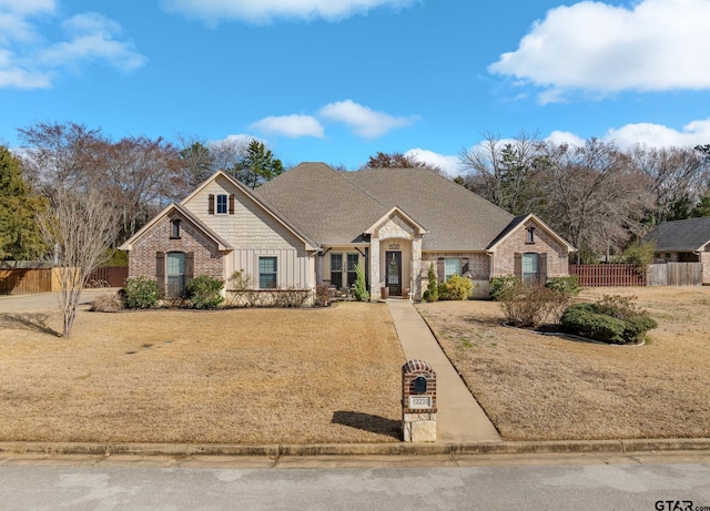 view of front of property with a front lawn