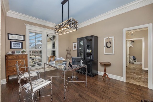 home office featuring dark hardwood / wood-style flooring, ornamental molding, and an inviting chandelier