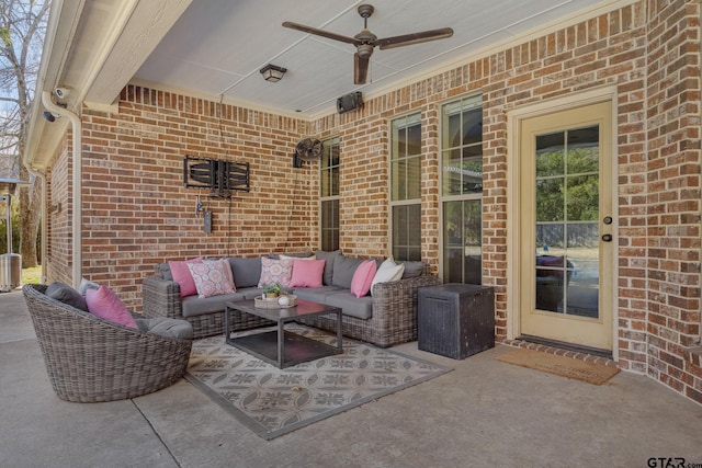 view of patio featuring an outdoor hangout area and ceiling fan