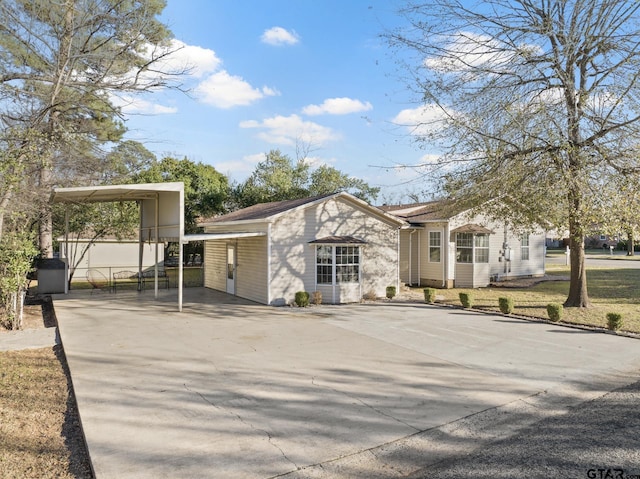 view of front facade featuring a carport