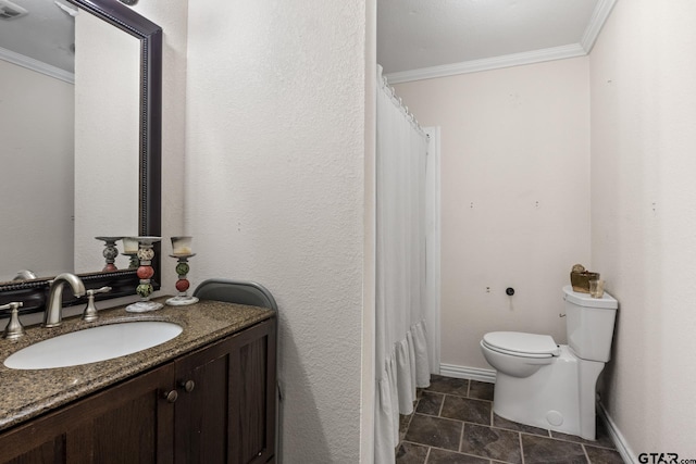 bathroom with walk in shower, toilet, vanity, and ornamental molding