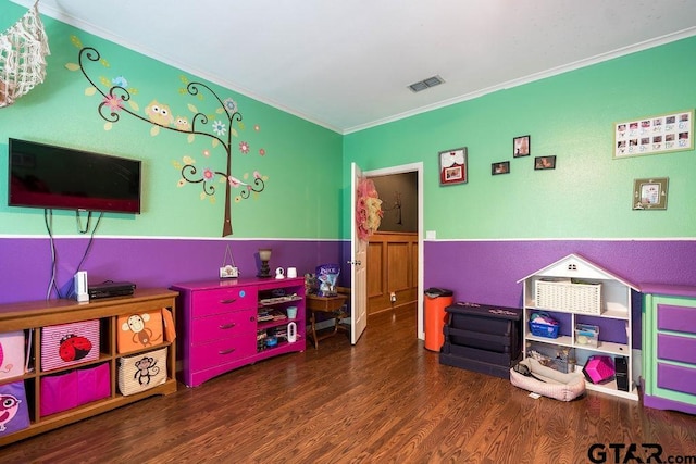 1017 Hilltop Dr, Palestine, TX 75801 - rec room featuring crown molding, wood finished floors, and visible vents