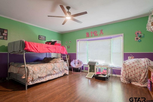 1017 Hilltop Dr, Palestine, TX 75801 - bedroom with baseboards, ceiling fan, ornamental molding, and wood finished floors