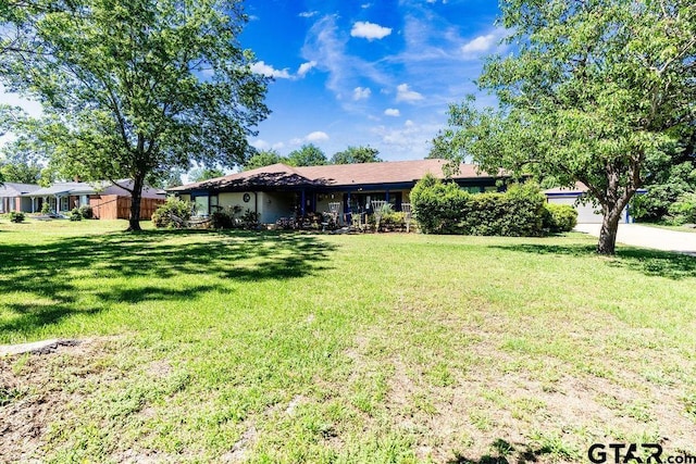 1017 Hilltop Dr, Palestine, TX 75801 - ranch-style home featuring fence and a front lawn