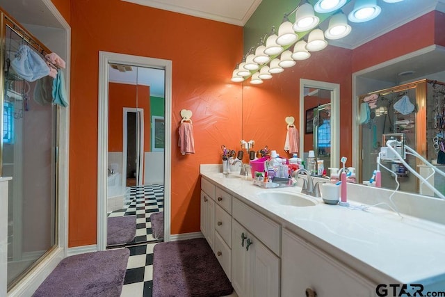 1017 Hilltop Dr, Palestine, TX 75801 - full bathroom with double vanity, tile patterned floors, a shower stall, and a sink