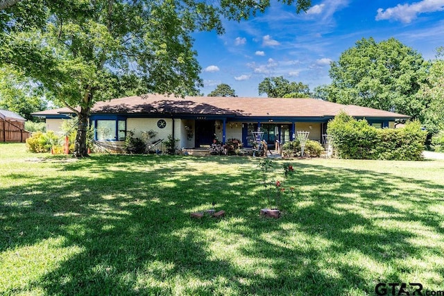 1017 Hilltop Dr, Palestine, TX 75801 - view of front of home with a porch and a front lawn