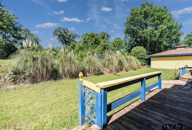 1017 Hilltop Dr, Palestine, TX 75801 - wooden deck featuring a yard