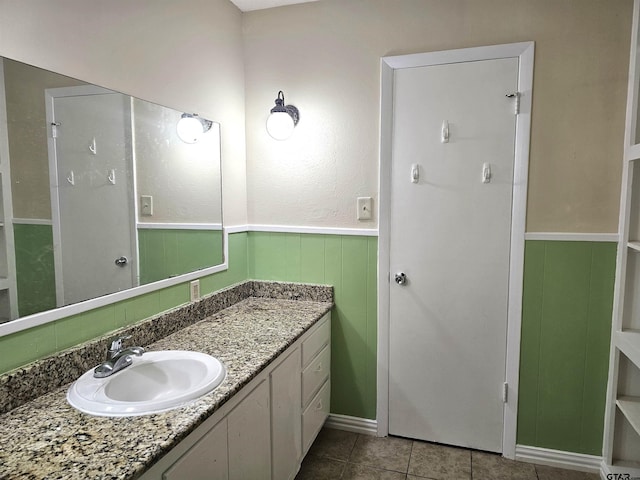 bathroom with vanity and tile patterned floors