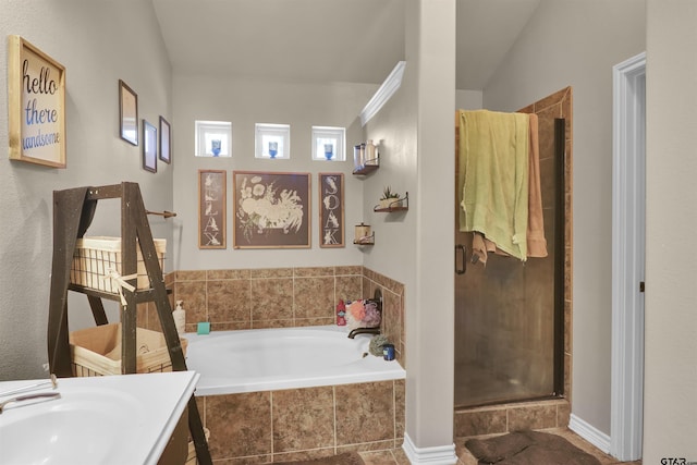 bathroom with separate shower and tub and vanity