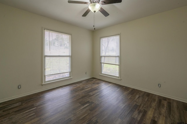 unfurnished room featuring dark hardwood / wood-style floors and ceiling fan