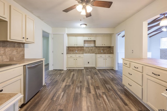 kitchen featuring ceiling fan, dark hardwood / wood-style floors, cream cabinets, decorative backsplash, and stainless steel dishwasher