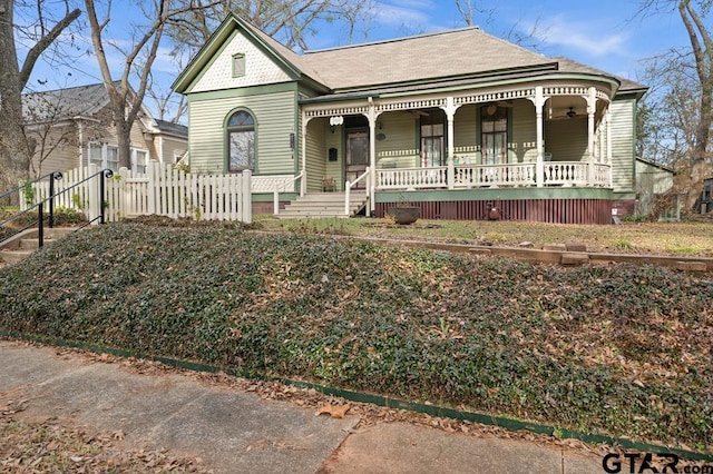 victorian-style house featuring a porch