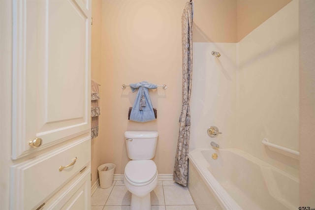 2215 Homestead Ln, Tyler, TX 75701 - full bath featuring toilet, tile patterned flooring, shower / bath combo, and baseboards