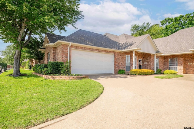2215 Homestead Ln, Tyler, TX 75701 - ranch-style home featuring concrete driveway, a front lawn, brick siding, and a garage