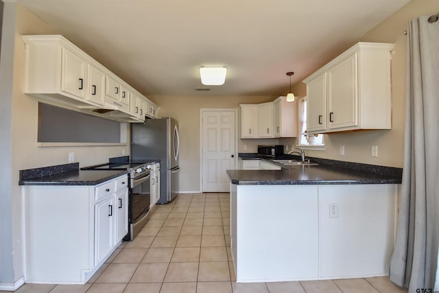 kitchen featuring sink, decorative light fixtures, stainless steel appliances, and white cabinets