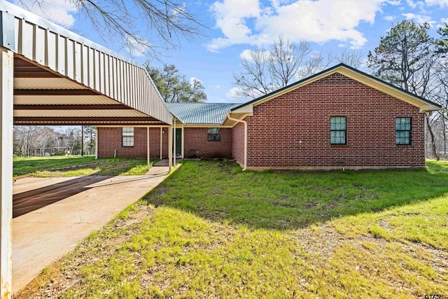 exterior space with a yard