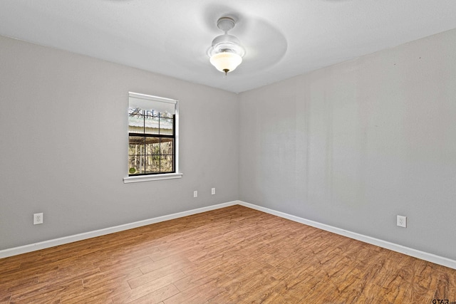 unfurnished room featuring hardwood / wood-style floors